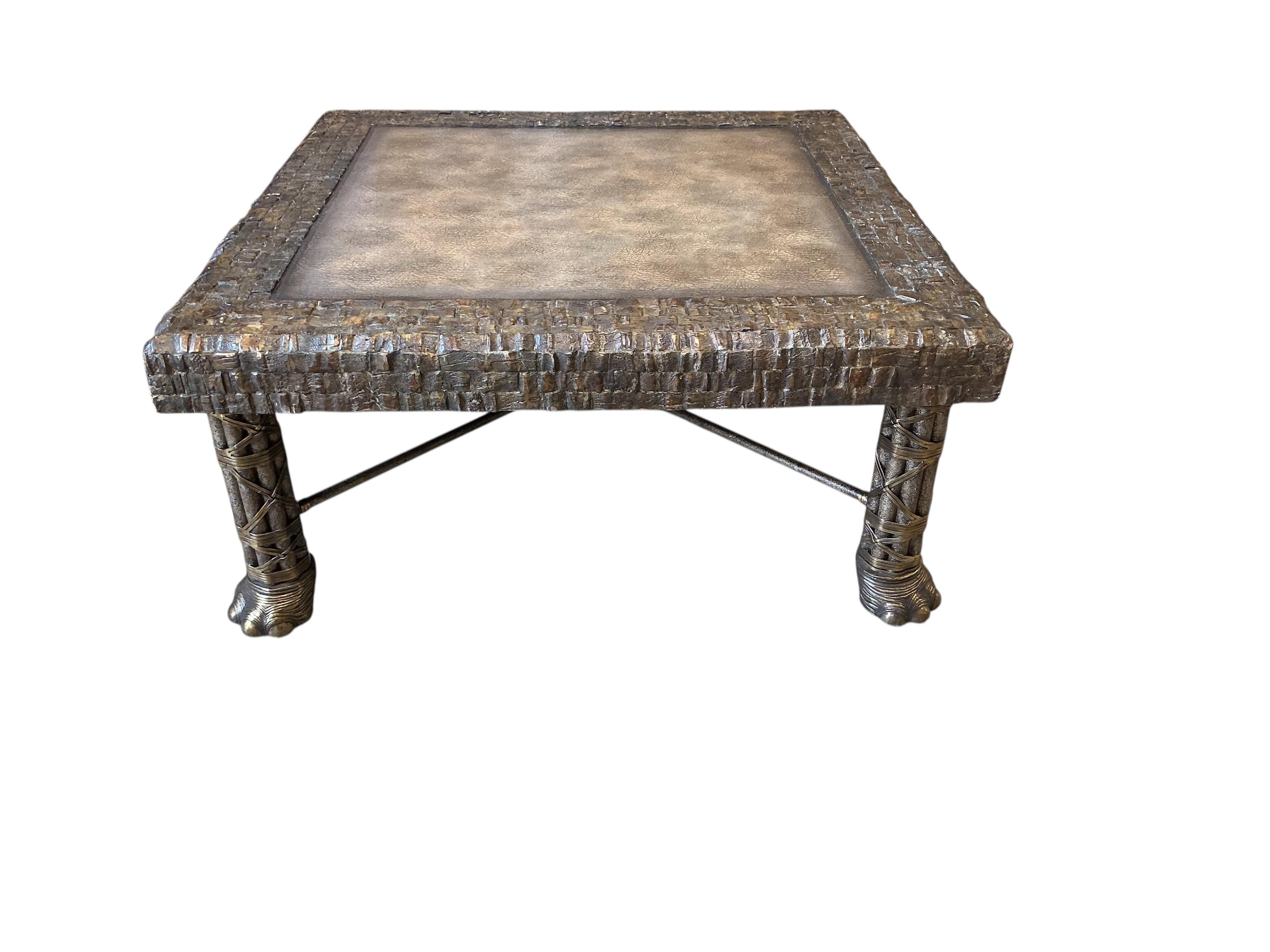 A Contemporary Maitland Smith square brass, leather top coffee table on cluster column, elephant foot supports, 108cm, height 48cm